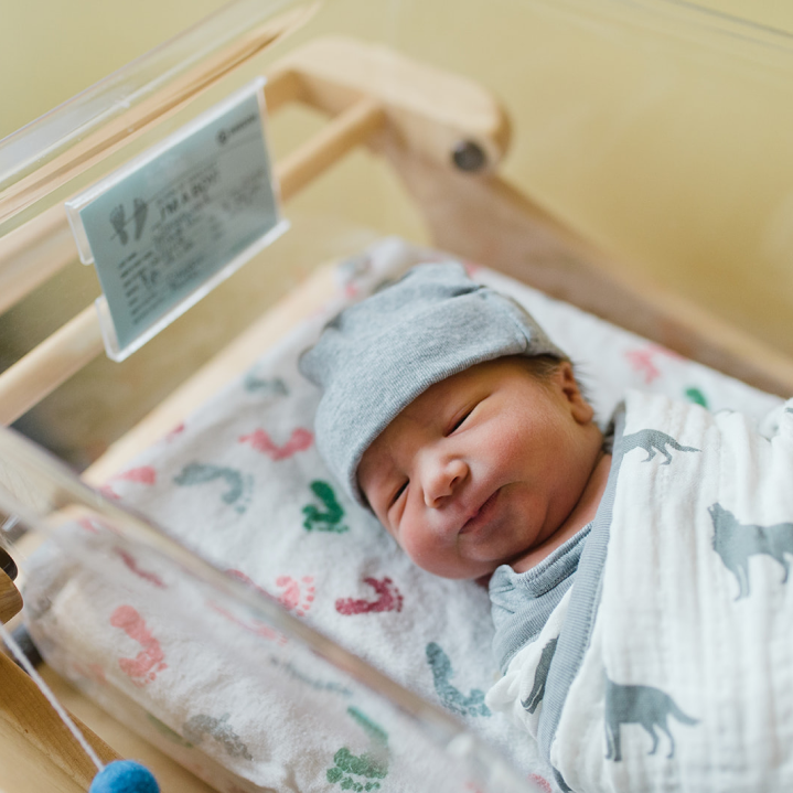 Fresh 48 photo of newborn in hospital bassinet